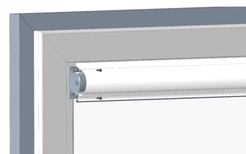 A felső tartó felcsavarozása az előfúrt nyílásokon keresztül